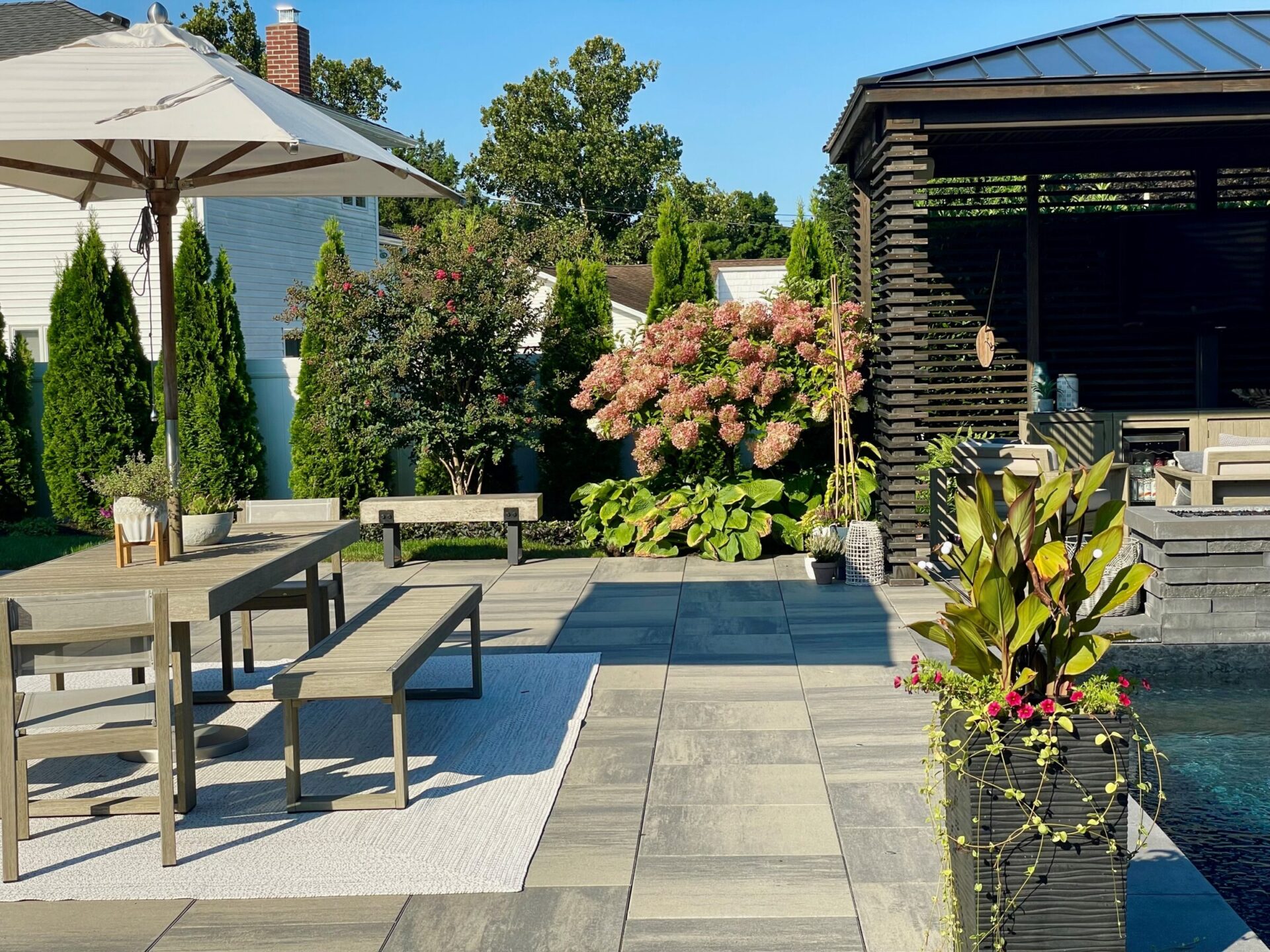 Gorgeous modern backyard, perfect design and aesthetics.  Home outdoor entertainment space has everything you desire.